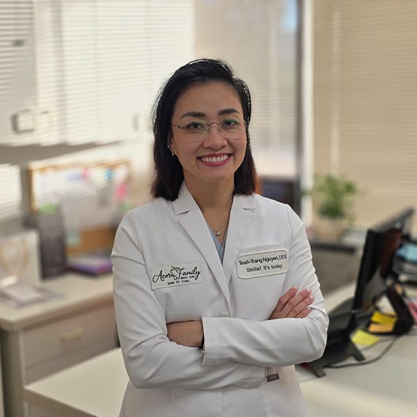 Dr. Nguyen performing a dental procedure in Berkeley CA