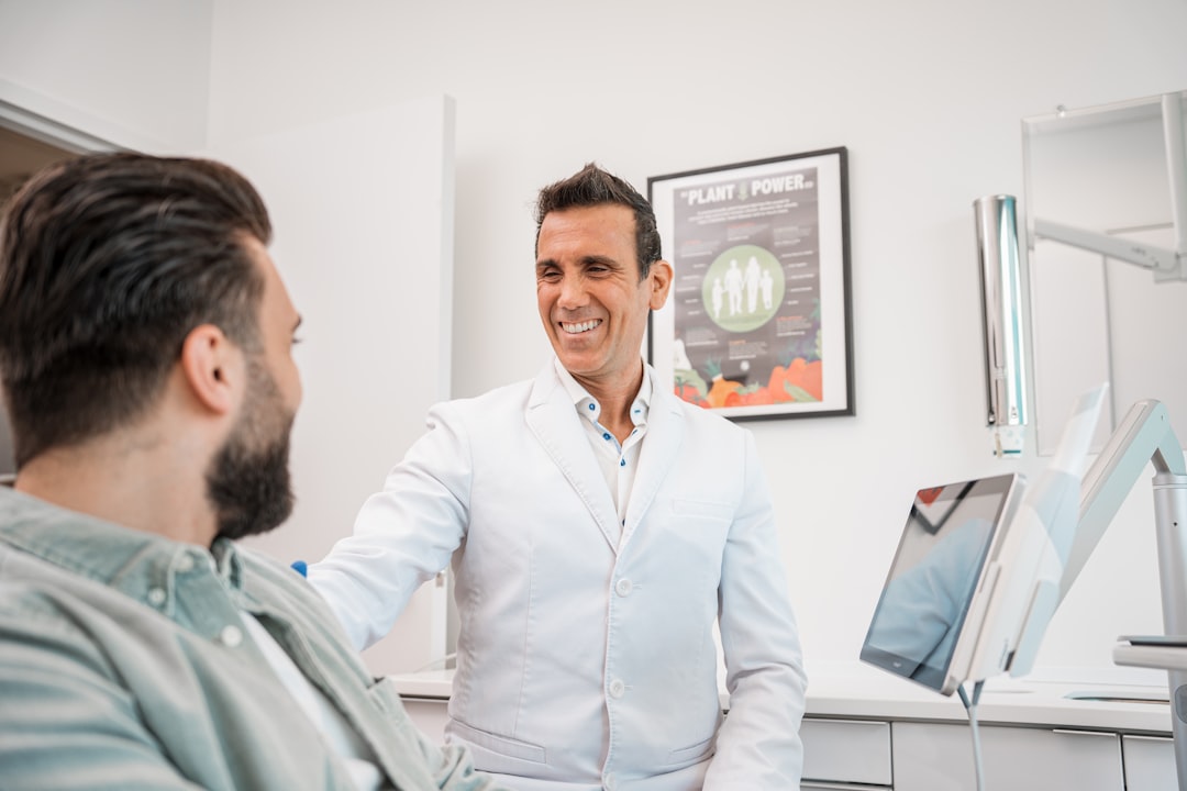 Patient reviewing a root canal vs filling treatment plan with a Berkeley dentist