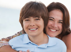 mother and son smiling